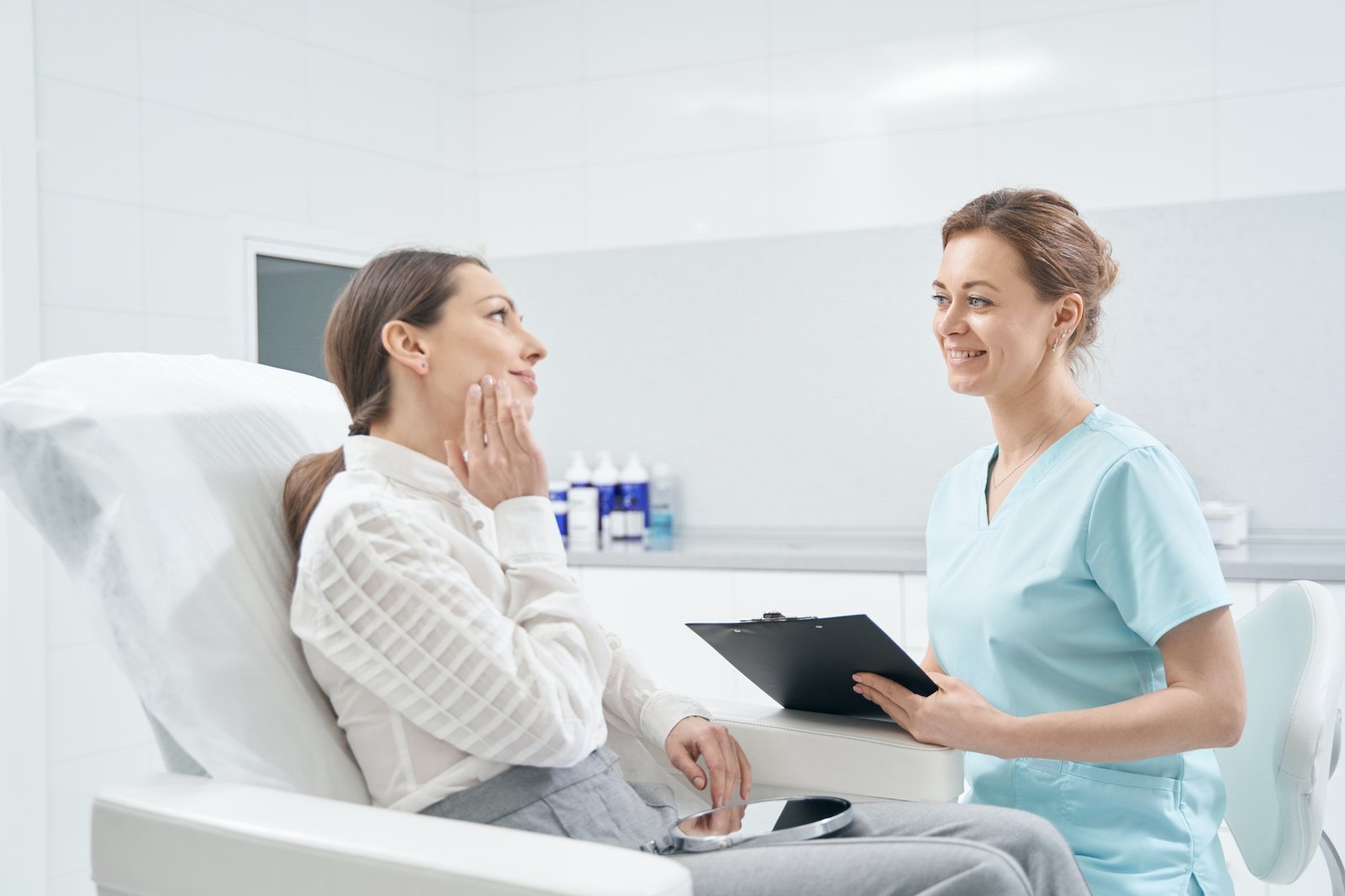 woman-talking-with-doctor-beautician-in-cosmetology-clinic.jpg
